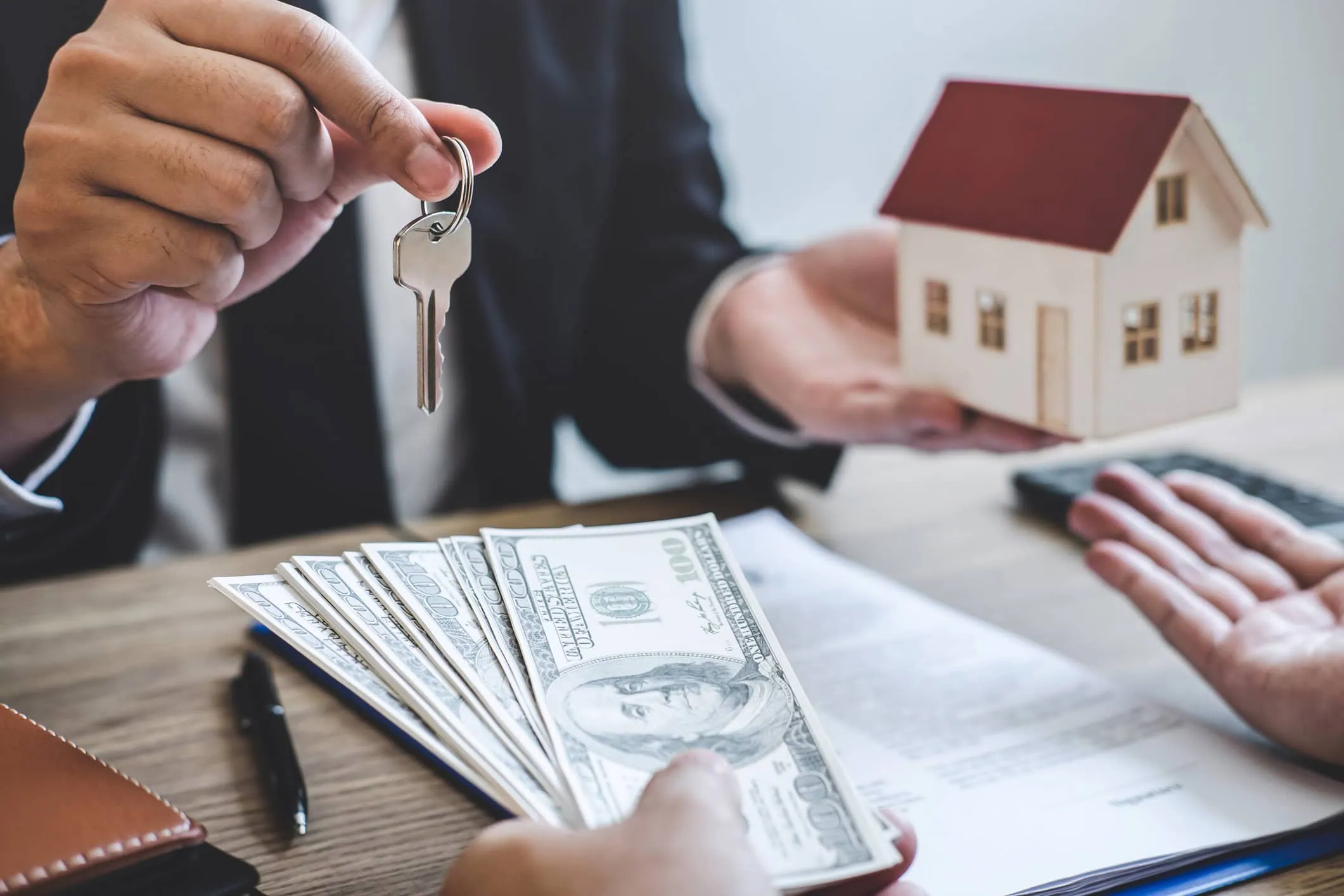 Holding Keys With Money Outreach